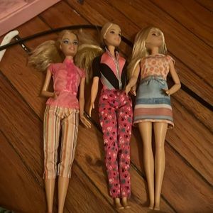 Barbie they all have clothes and they all have blonde hair